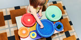 Child playing with Stapelstein® Inside Set